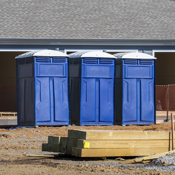 how often are the portable restrooms cleaned and serviced during a rental period in Massie